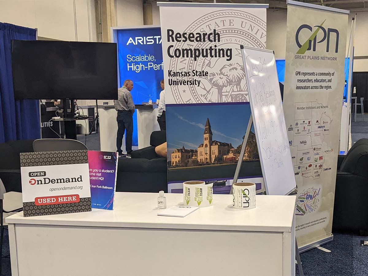 Kansas State booth at SC22 with Open OnDemand placard