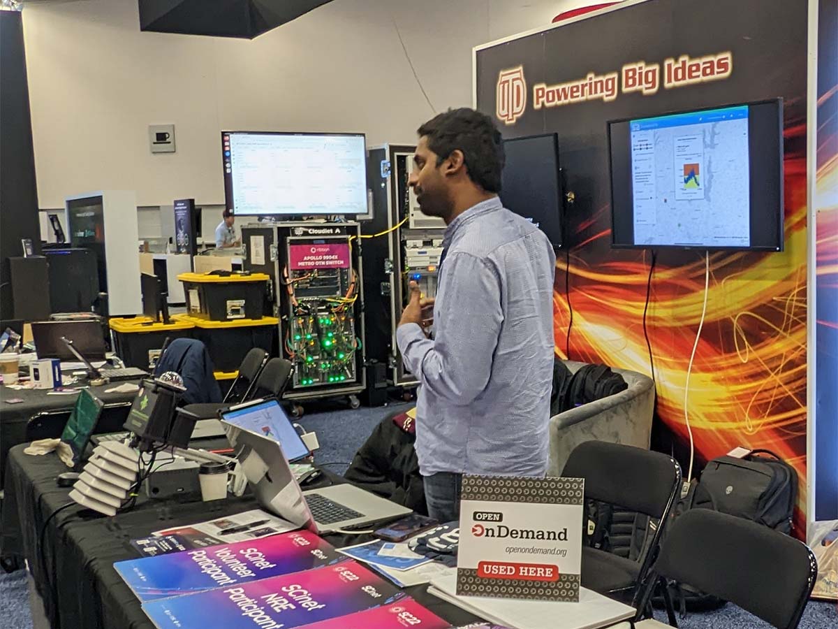 UTD booth at SC22 with Open OnDemand placard