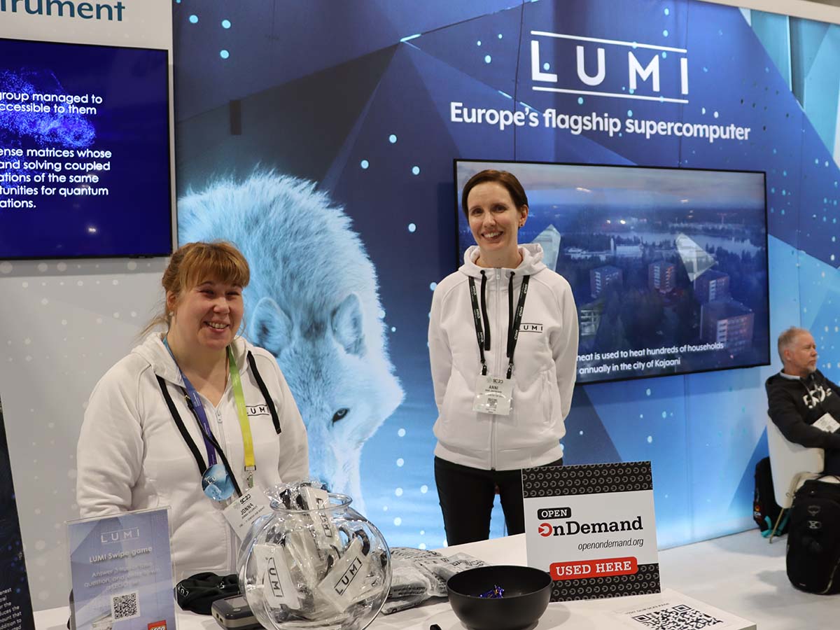 CSC Finland/Lumi booth at SC23 with Open OnDemand placard