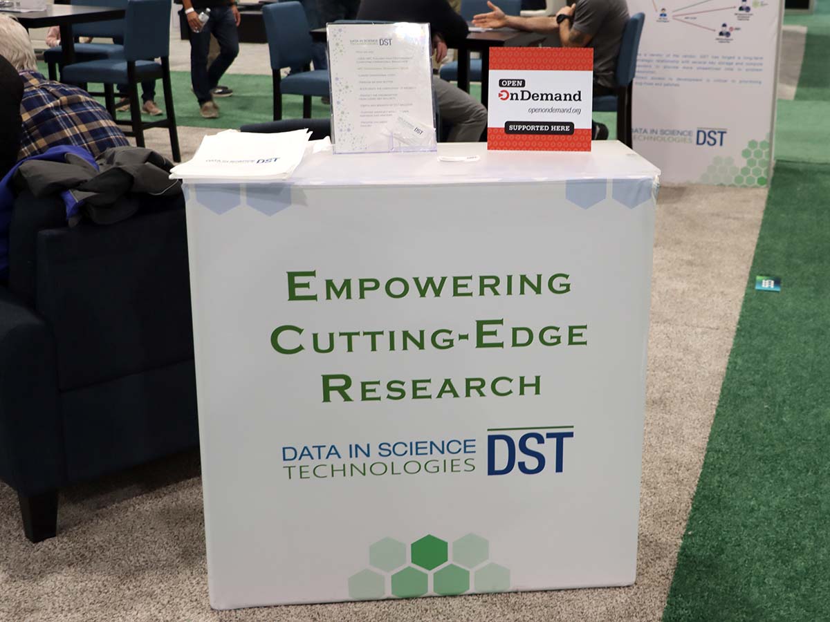 DST booth at SC23 with Open OnDemand placard