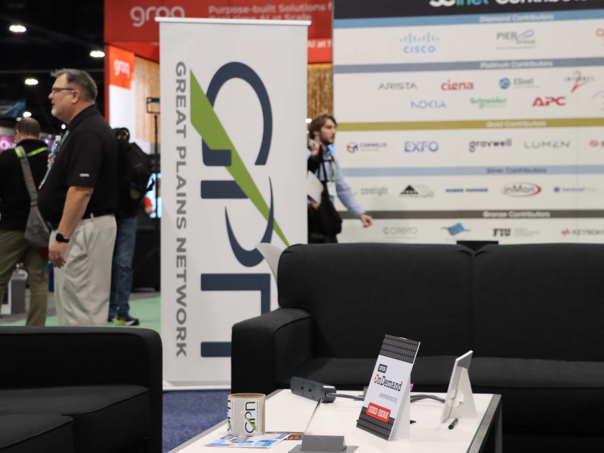 Great Plains Network booth at SC23 with Open OnDemand placard