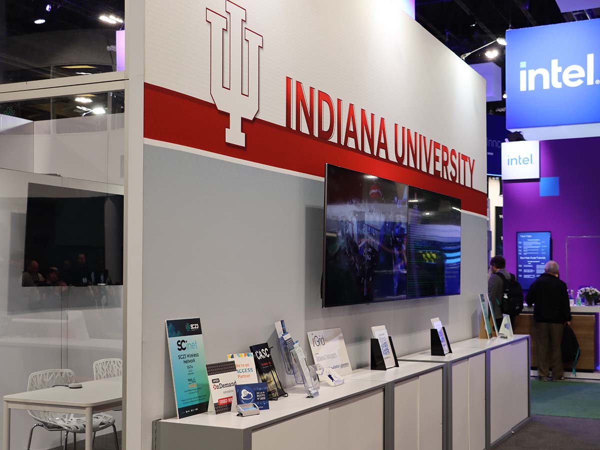 Indiana University booth at SC23 with Open OnDemand placard