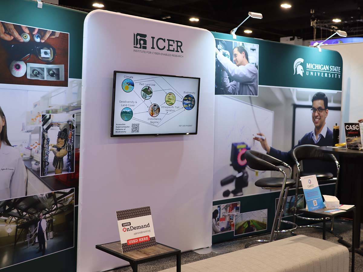 Michigan State booth at SC23 with Open OnDemand placard