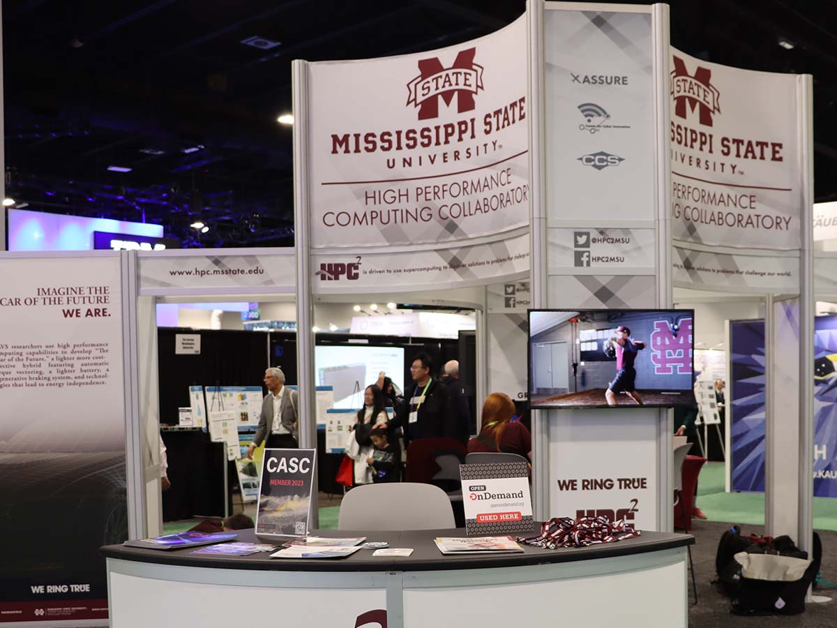 Mississippi State booth at SC23 with Open OnDemand placard
