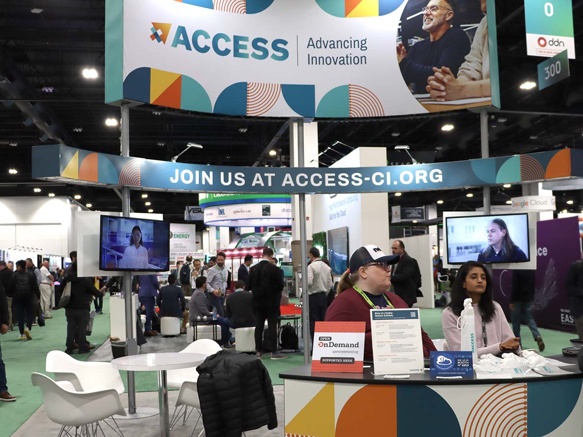 NSF ACCESS booth at SC23 with Open OnDemand placard
