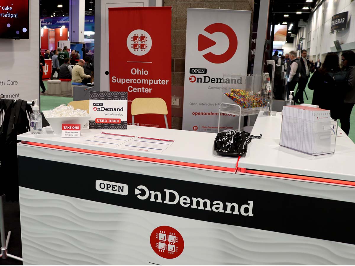 Ohio Supercomputer Center booth at SC23 with Open OnDemand placard