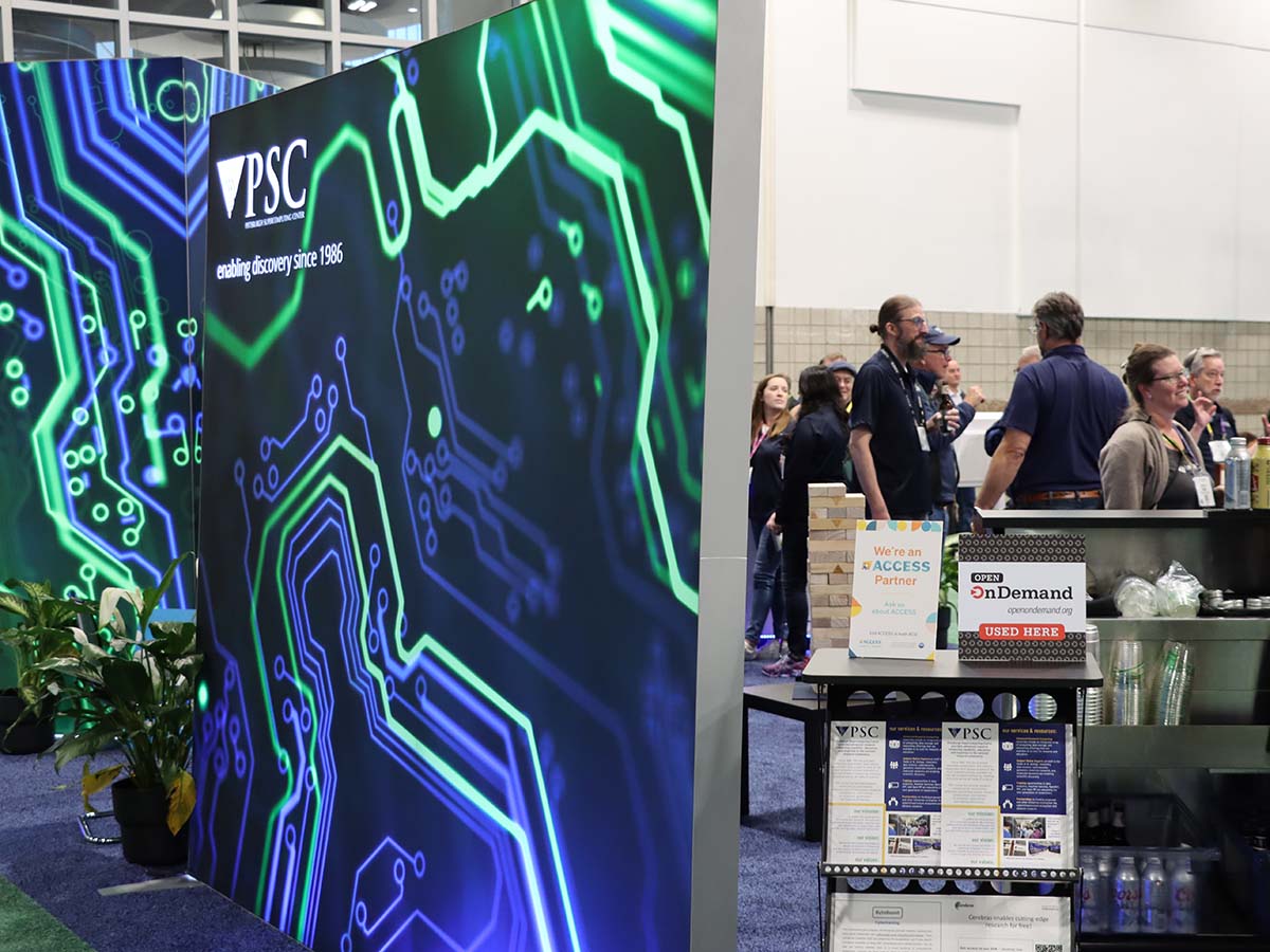 PSC booth at SC23 with Open OnDemand placard