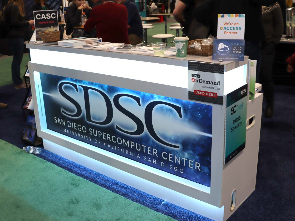 SDSC booth at SC23 with Open OnDemand placard