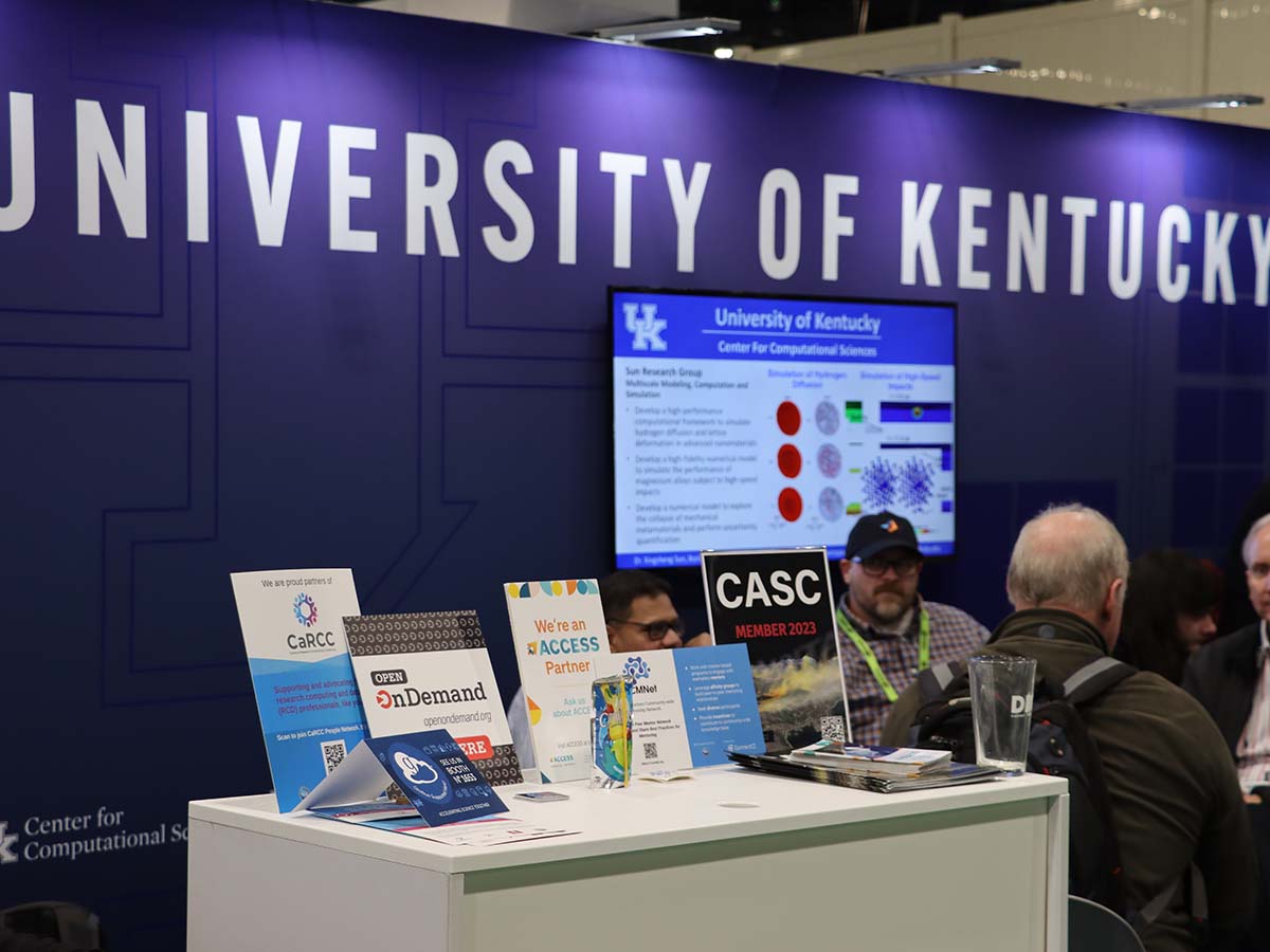 Kentucky booth at SC23 with Open OnDemand placard