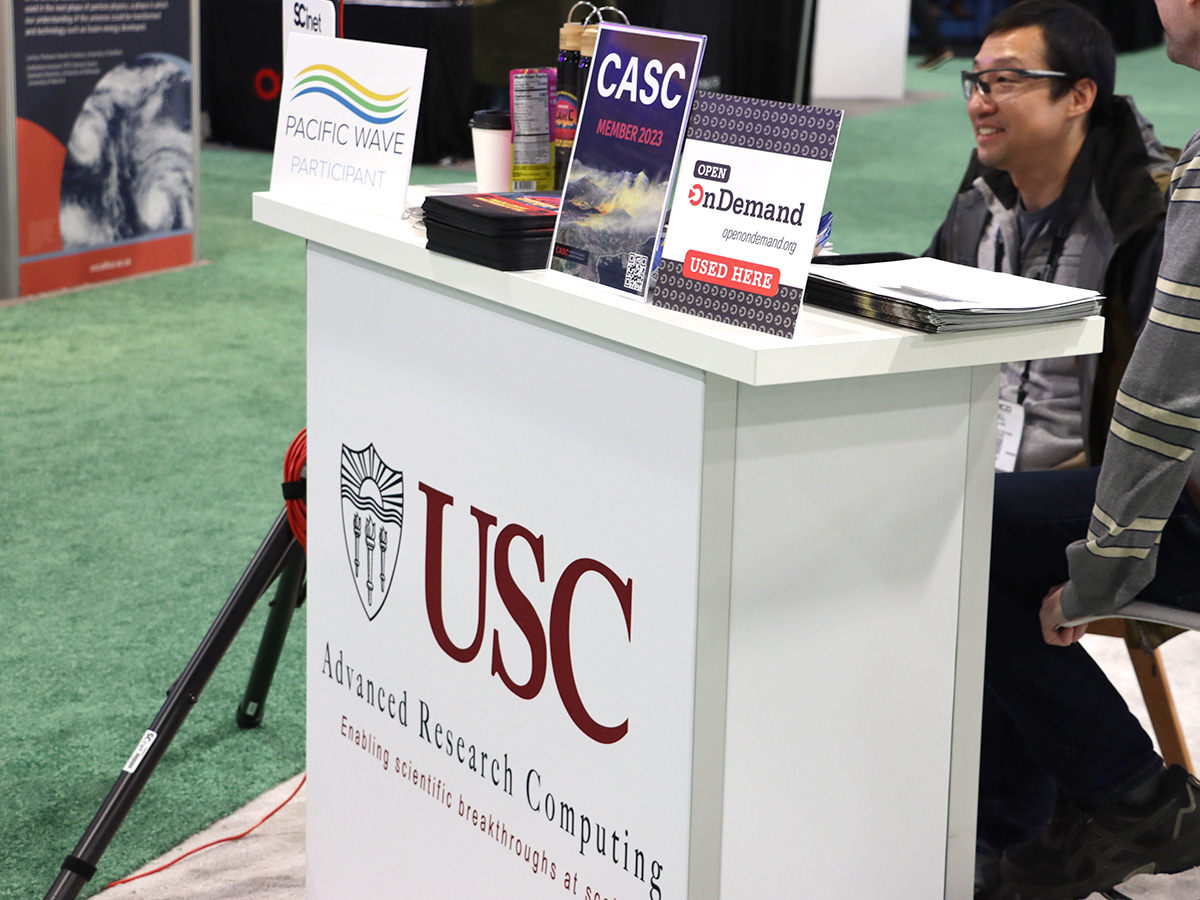 USC booth at SC23 with Open OnDemand placard