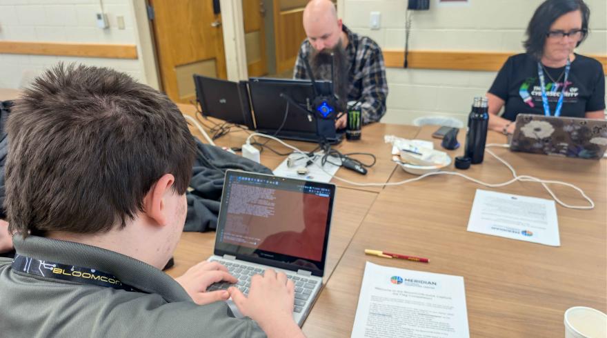 Participants work through capture-the-flag challenges during BloomCON 0x0A